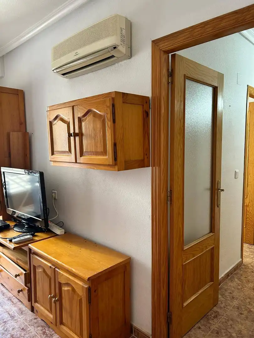 Schlafzimmer von Wohnung zum Verkauf in Torrevieja mit Klimaanlage, Heizung und Privatgarten
