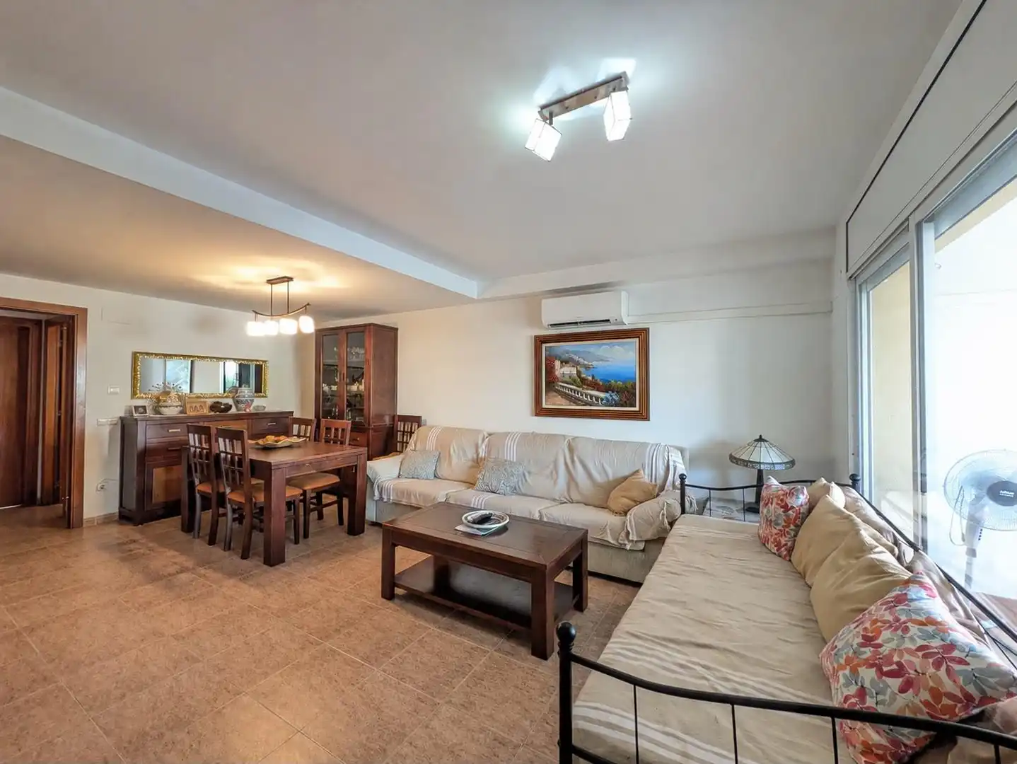 Sala de estar de Casa adosada en venta en Creixell con Aire acondicionado, Jardín privado y Terraza