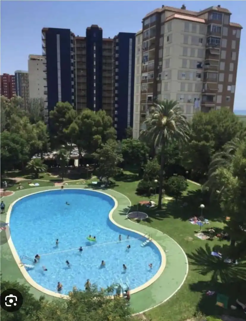 Piscina de Apartament de lloguer en La Pobla de Farnals amb Jardí privat