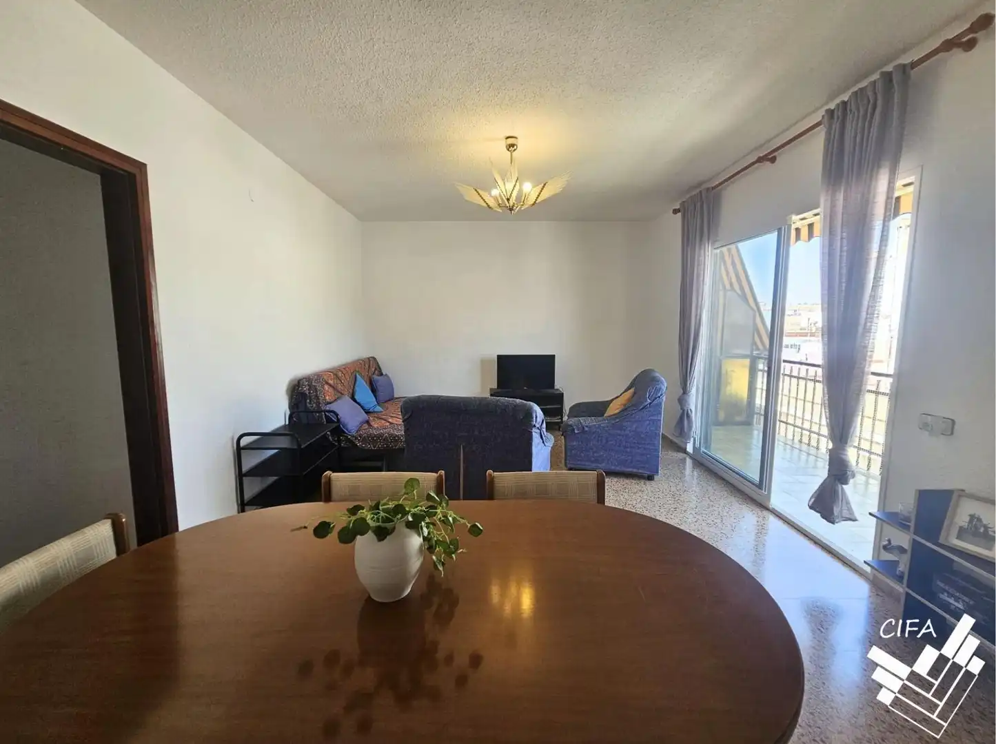 Living room of Flat for sale in Alcanar  with Air Conditioner, Terrace and Furnished