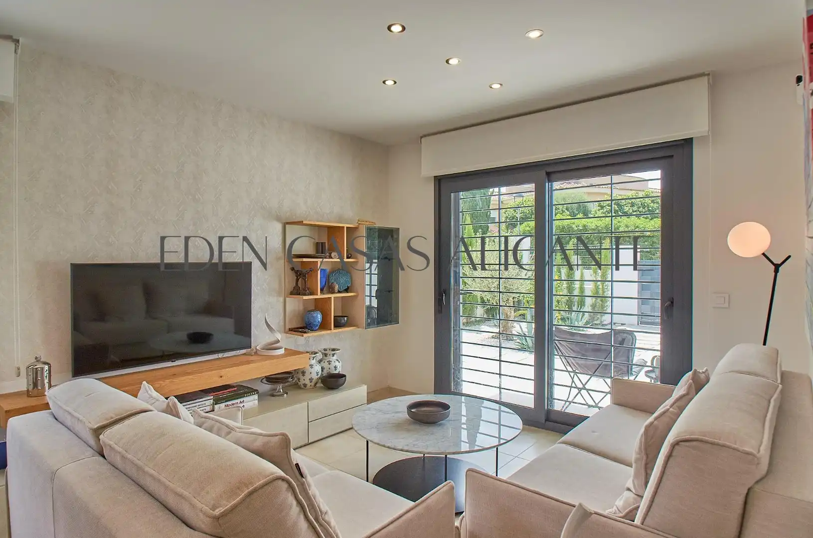 Sala de estar de Casa adosada en venta en Busot con Aire acondicionado, Calefacción y Jardín privado