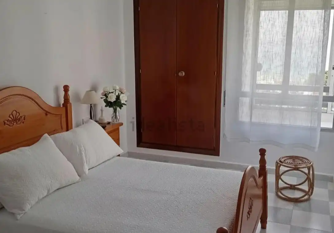 Dormitori de Apartament de lloguer en El Puerto de Santa María amb Terrassa i Moblat