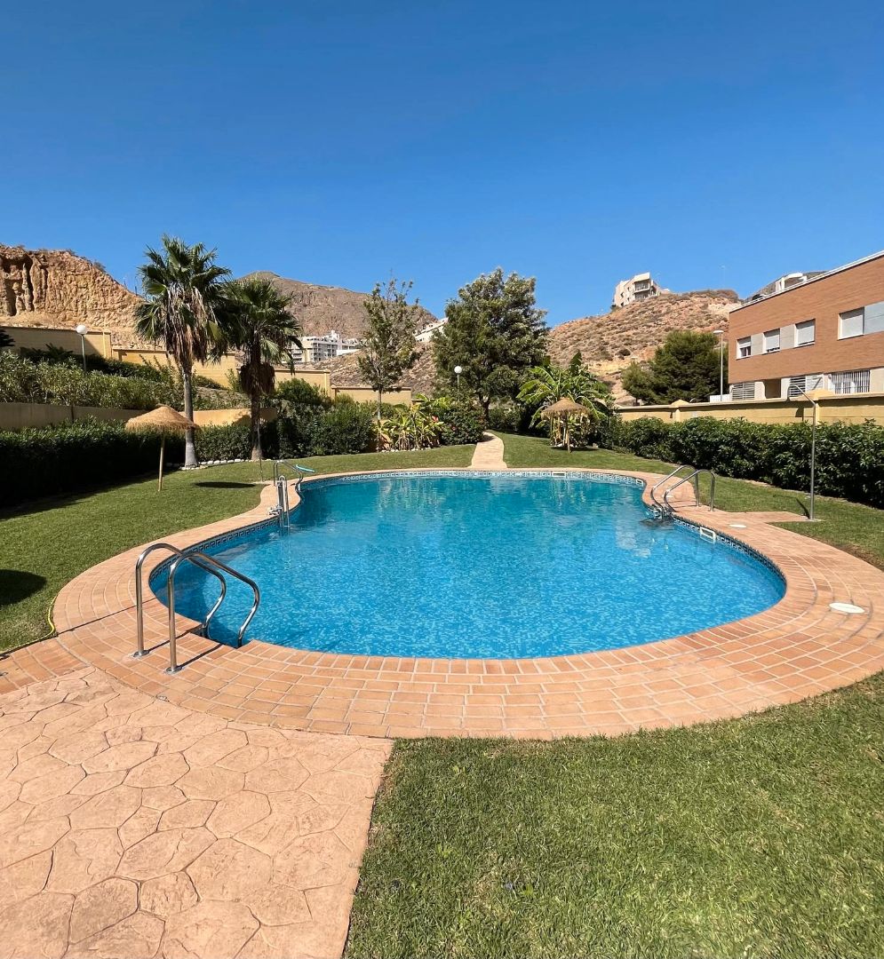 Swimming pool of Flat for rent in Roquetas de Mar  with Air Conditioner, Terrace and Furnished