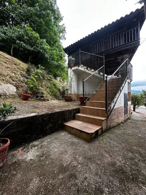 Vista exterior de Casa adosada en venda en Pravia amb Calefacció, Jardí privat i Terrassa