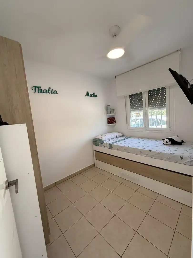 Dormitori de Apartament de lloguer en El Verger amb Aire condicionat, Jardí privat i Piscina