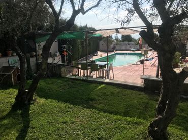 Casa rústica amb jardí en venda a Urbanizacion el alamo 1