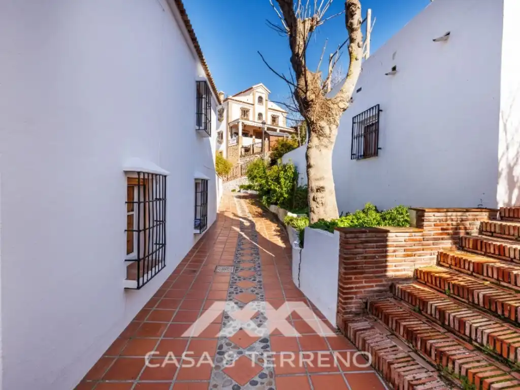 Vista exterior de Casa adosada en venta en Comares con Aire acondicionado, Terraza y Piscina