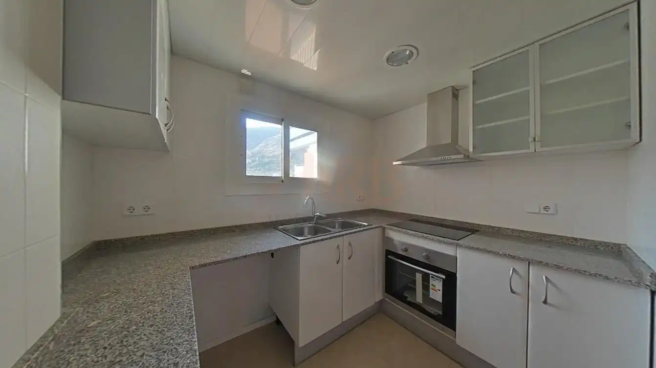 Cocina de Piso en venta en Castelldefels con Terraza y Piscina comunitaria