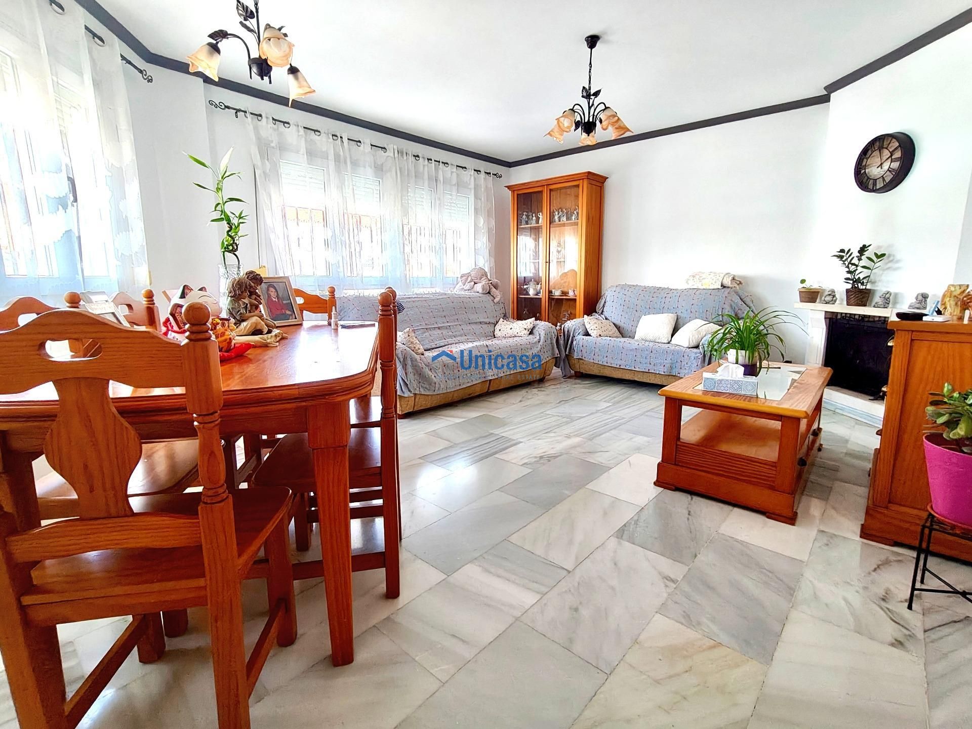 Sala d'estar de Casa adosada en venda en Málaga Capital amb Terrassa