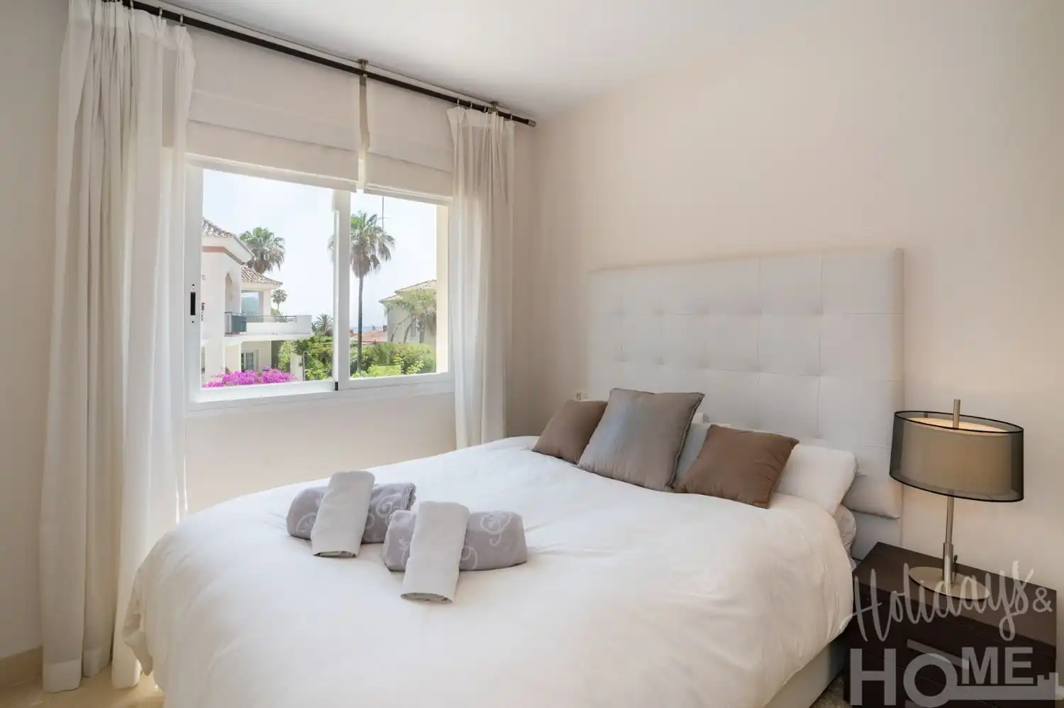 Dormitori de Pis de lloguer en Marbella amb Aire condicionat, Jardí privat i Terrassa