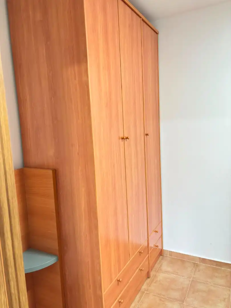 Dormitori de Apartament de lloguer en Moclinejo amb Rentadora i Balcó