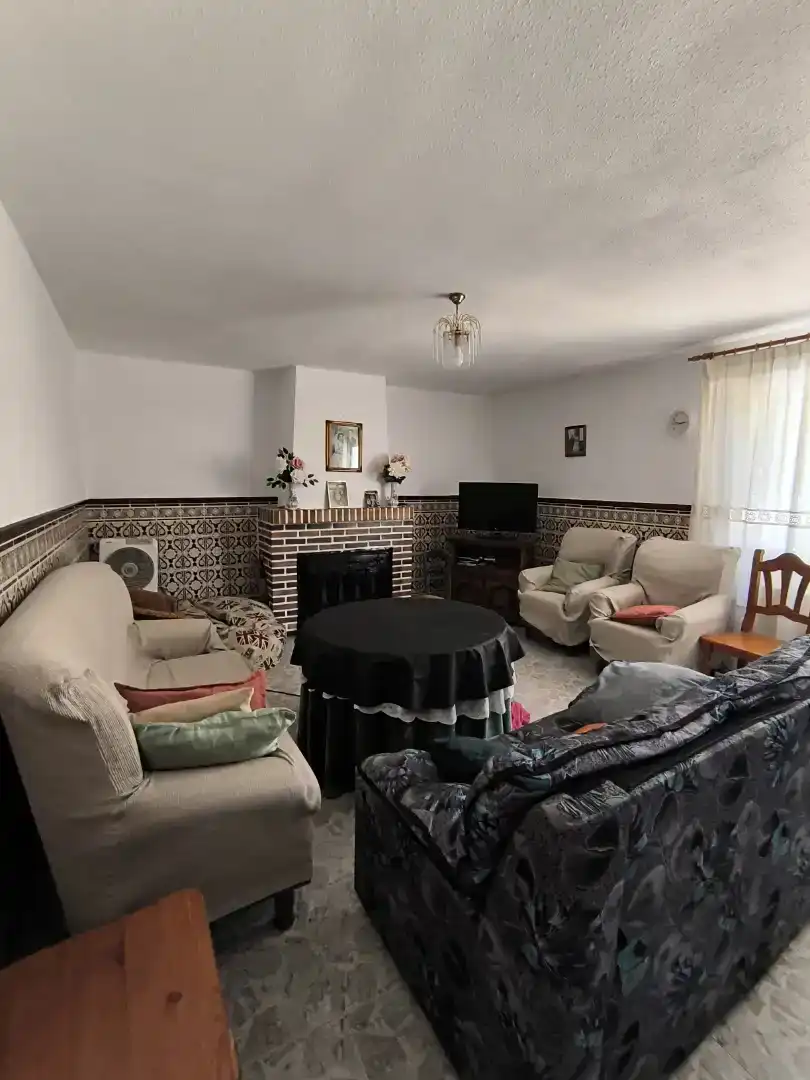 Sala de estar de Casa adosada en venta en El Robledo  