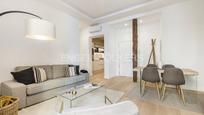 Sala d'estar de Apartament en venda en  Madrid Capital amb Aire condicionat, Calefacció i Parquet