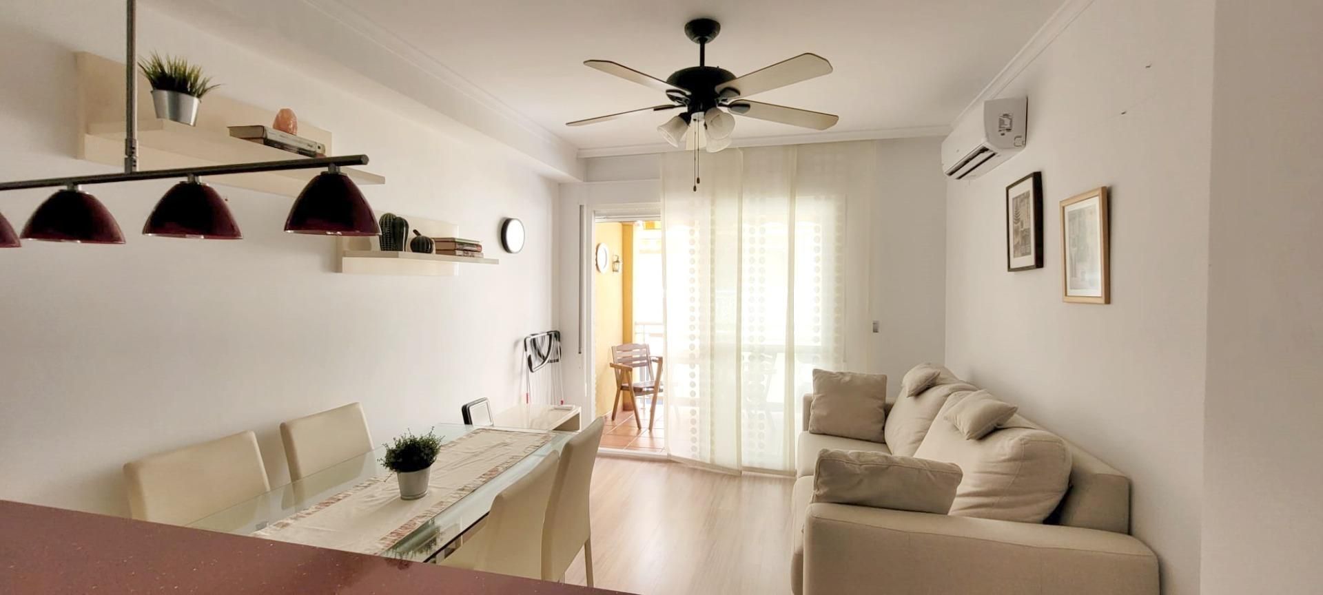 Sala d'estar de Pis en venda en Torrox amb Aire condicionat, Jardí privat i Terrassa