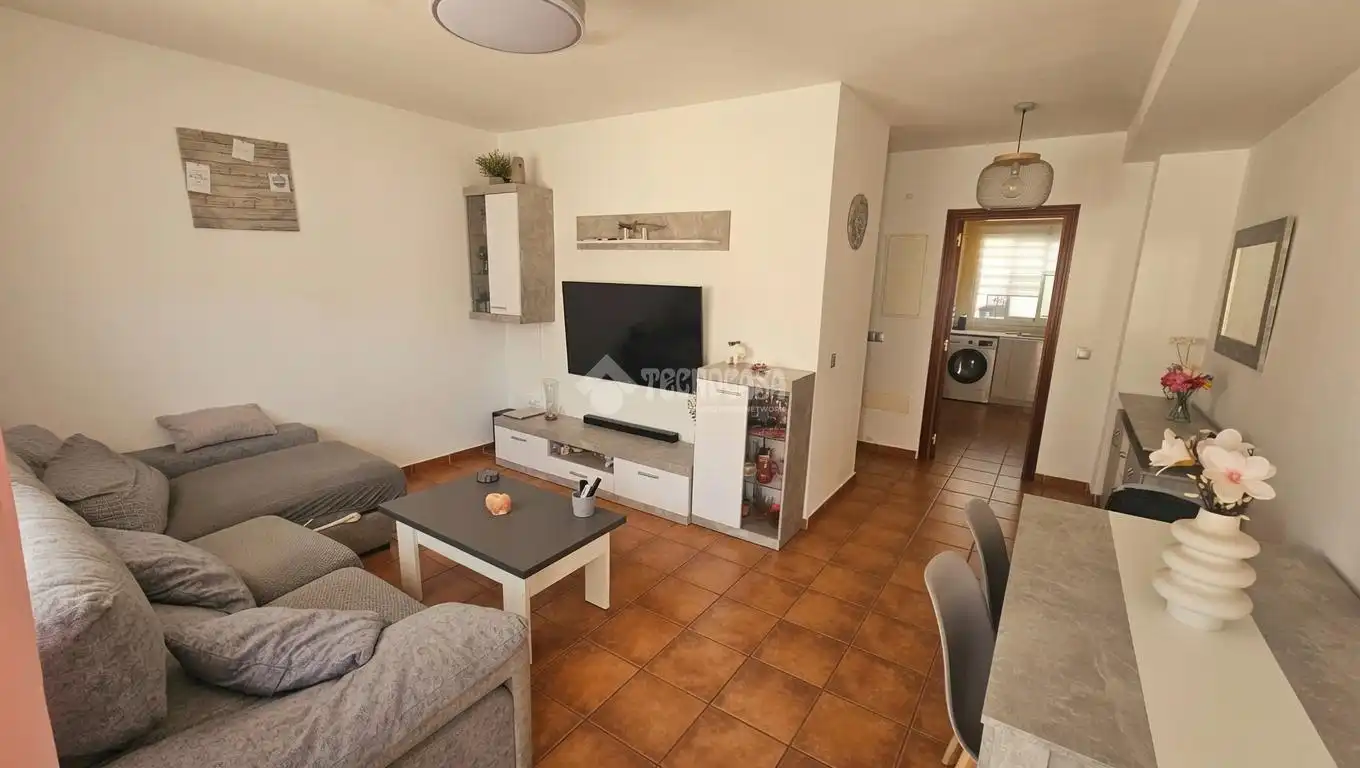 Sala de estar de Casa adosada en venta en Almogía con Aire acondicionado y Terraza