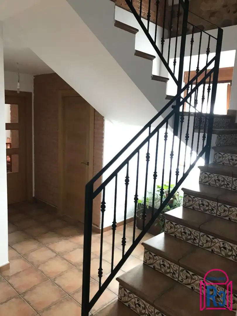 Casa adosada en venda en Cuadros amb Calefacció i Jardí privat
