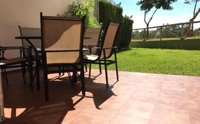 Terrassa de Casa adosada de lloguer en Islantilla amb Aire condicionat, Jardí privat i Terrassa