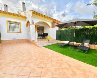 Jardí de Casa o xalet de lloguer en Pilar de la Horadada amb Aire condicionat, Terrassa i Piscina