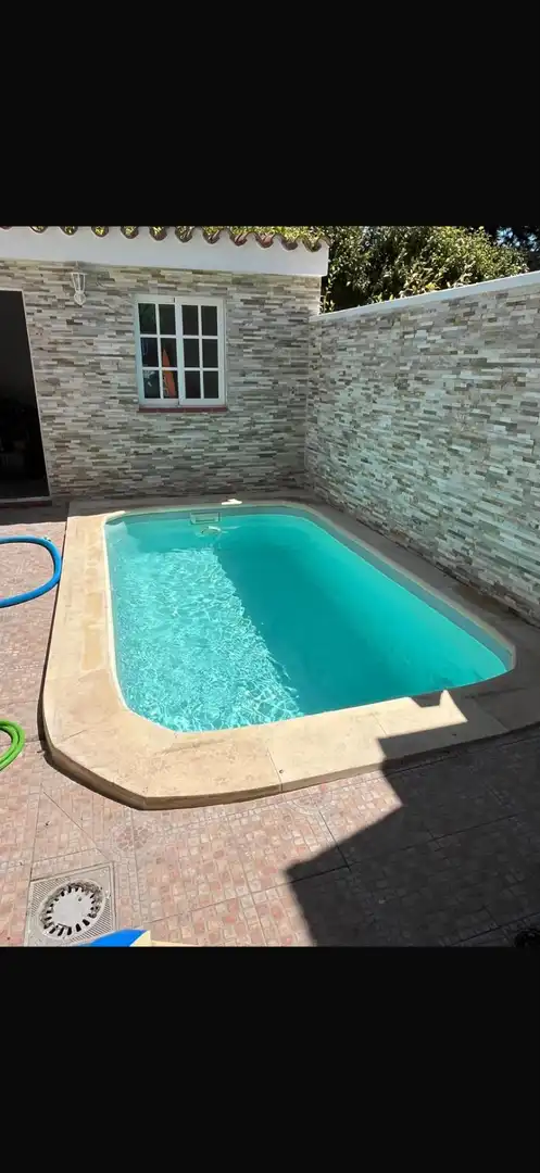 Terraced house with pool for sale in Paseo de las Palmeras
