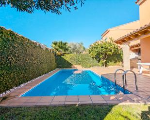 Piscina de Casa adosada de lloguer en La Pobla de Vallbona amb Calefacció, Jardí privat i Terrassa