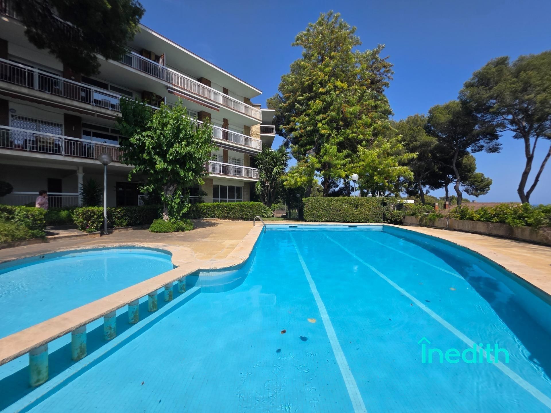 Swimming pool of Flat for sale in Castelldefels  with Air Conditioner, Heating and Parquet flooring