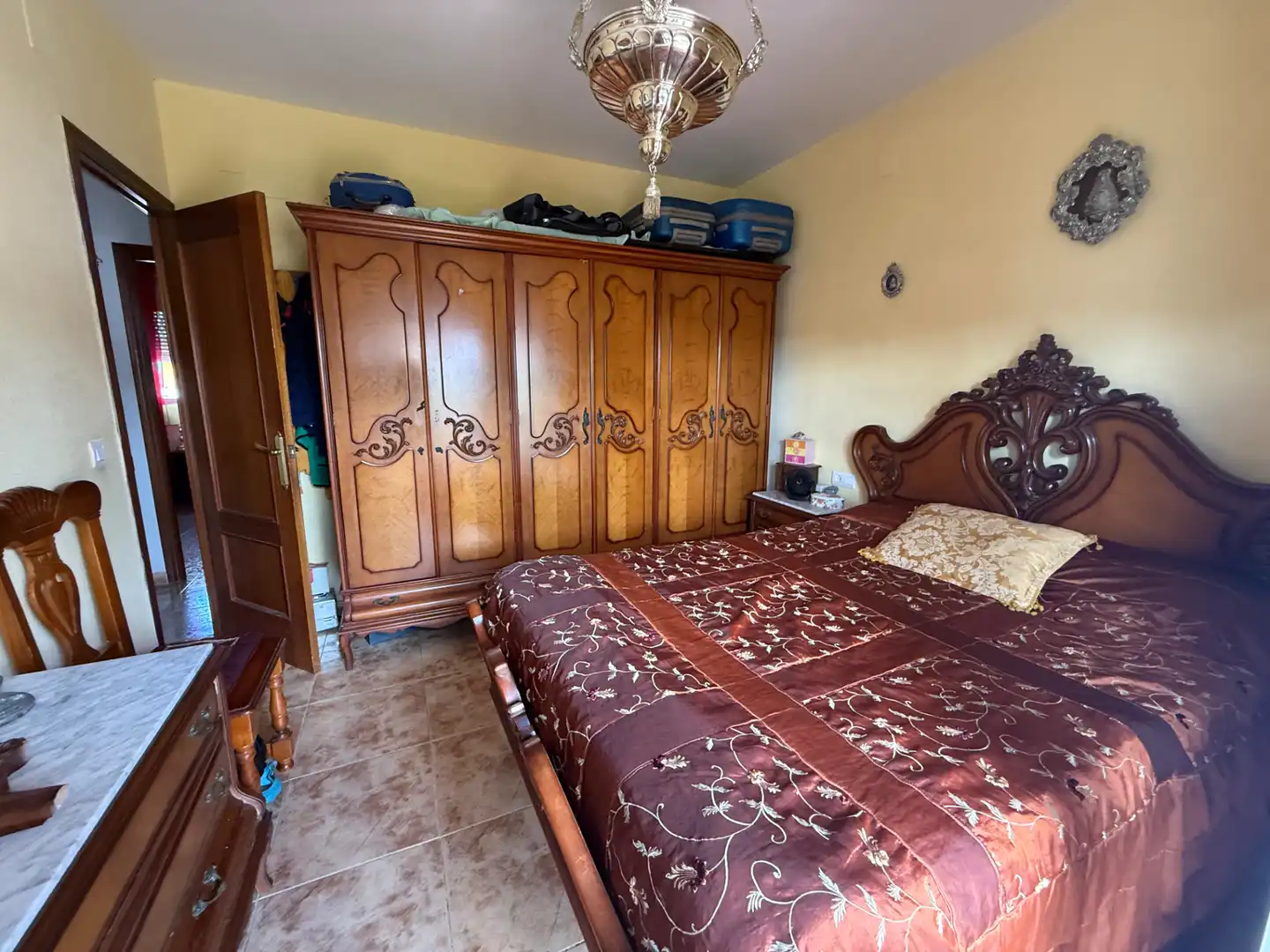 Schlafzimmer von Einfamilien-Reihenhaus zum Verkauf in Aljaraque mit Klimaanlage, Heizung und Privatgarten