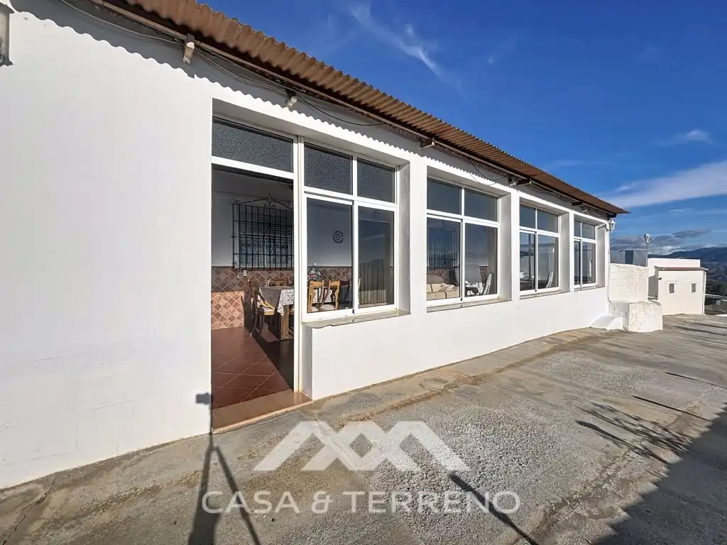 Vista exterior de Casa o chalet en venta en Macharaviaya con Aire acondicionado, Jardín privado y Terraza