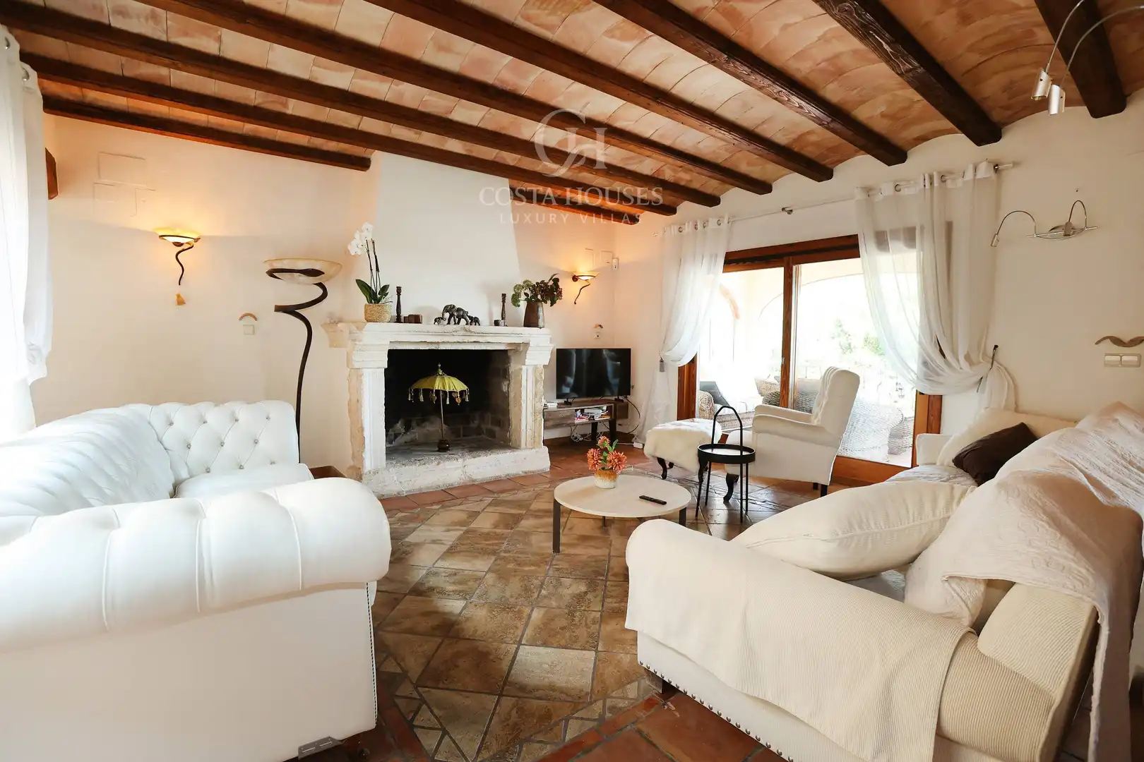 Sala d'estar de Casa o xalet en venda en Benissa amb Aire condicionat, Jardí privat i Terrassa