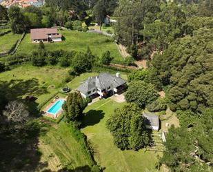 Vista exterior de Casa o xalet en venda en Oleiros amb Calefacció, Jardí privat i Terrassa