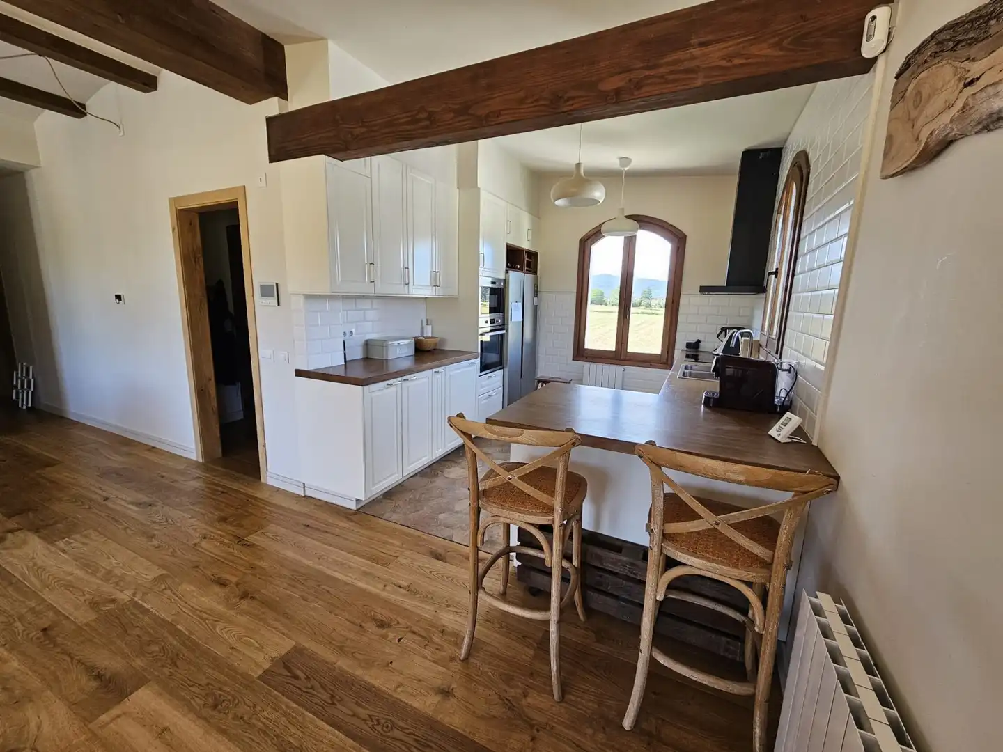 Cocina de Dúplex de alquiler en La Vall d'en Bas con Terraza, Piscina y Amueblado