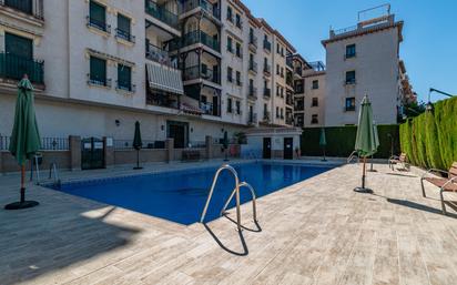 Swimming pool of Flat for sale in Ogíjares  with Air Conditioner, Heating and Storage room