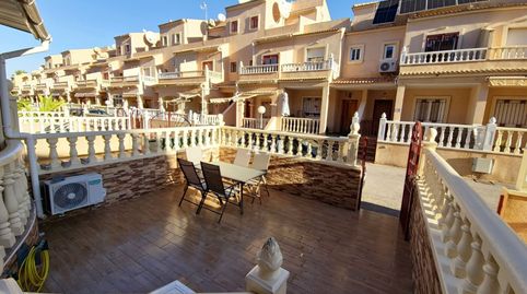 Foto 2 von Einfamilien-Reihenhaus zum Verkauf in Playa Flamenca, Orihuela