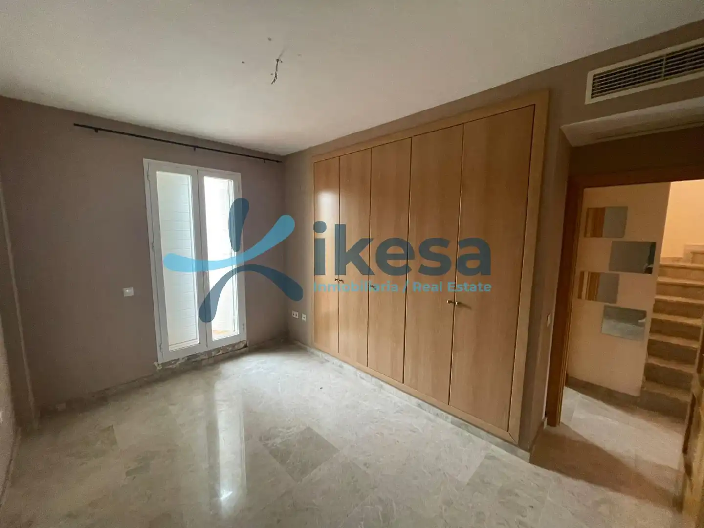 Habitación de Casa adosada en venta en Castilleja de la Cuesta con Aire acondicionado