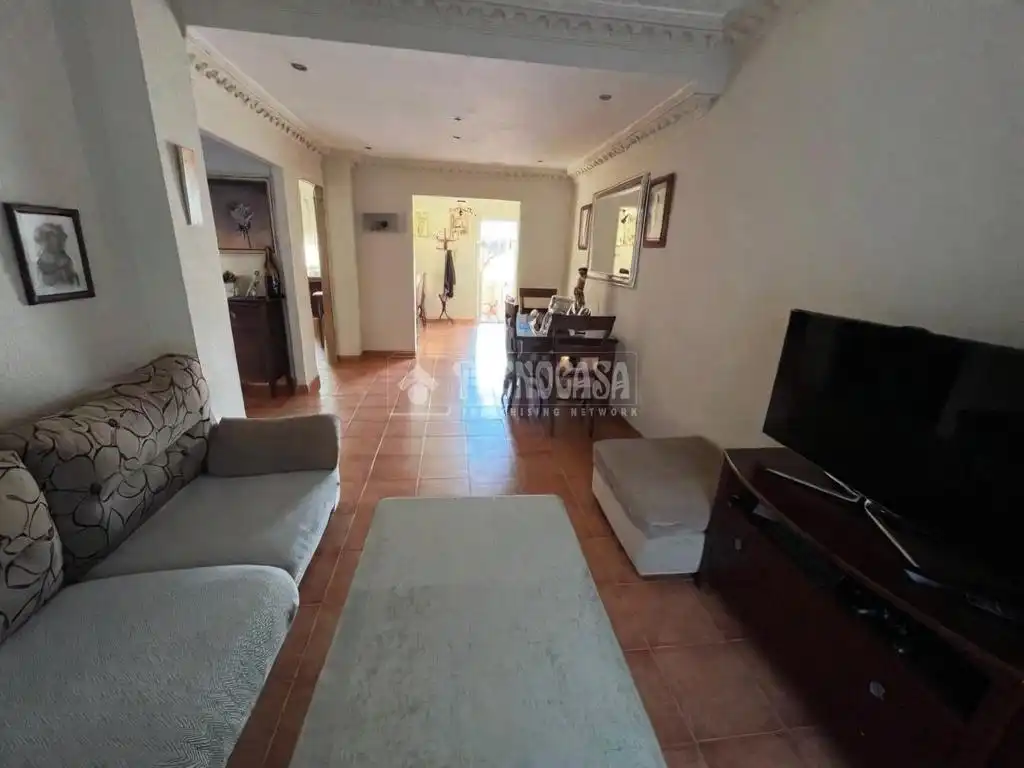 Sala de estar de Casa adosada en venta en Dos Hermanas con Terraza