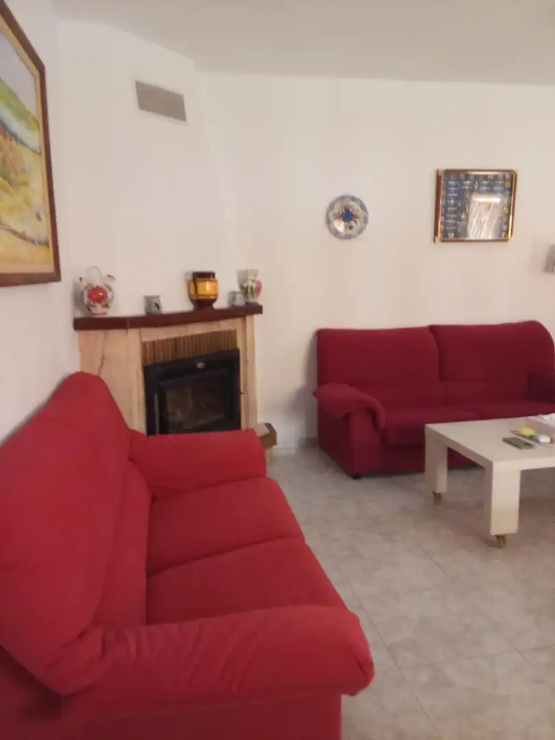 Sala d'estar de Casa o xalet en venda en Cullera amb Aire condicionat, Jardí privat i Moblat