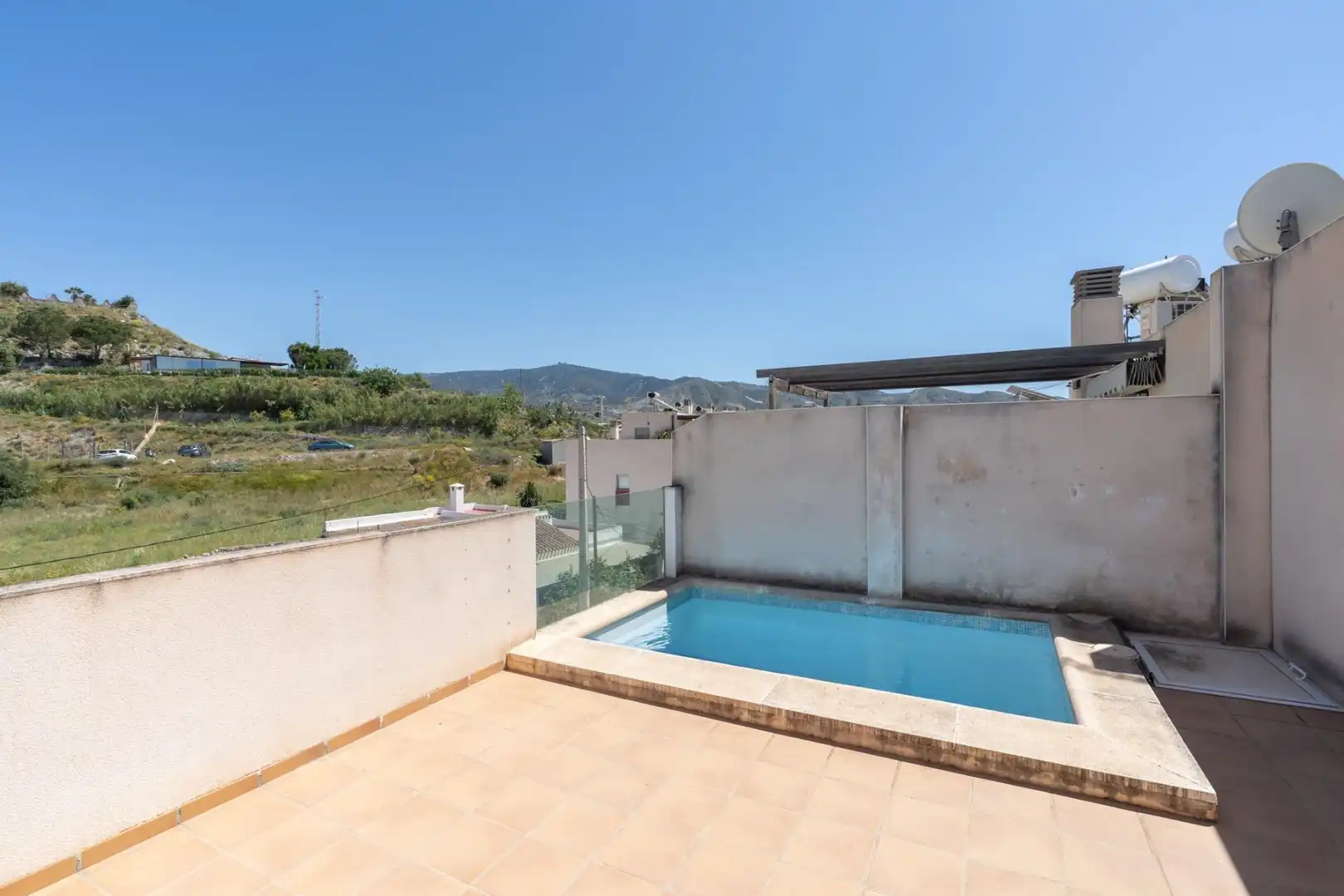 Piscina de Casa adosada en venta en Motril con Aire acondicionado, Terraza y Trastero
