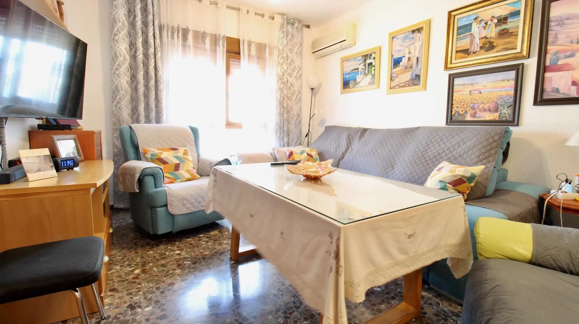Sala de estar de Casa adosada en venta en Vegas del Genil con Aire acondicionado, Calefacción y Terraza
