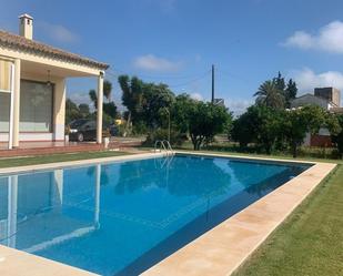 Swimming pool of House or chalet for sale in  Sevilla Capital  with Air Conditioner and Swimming Pool