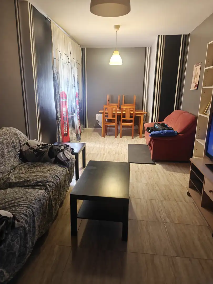 Sala de estar de Planta baja en venta en Quintanar de la Orden con Calefacción, Parquet y Amueblado