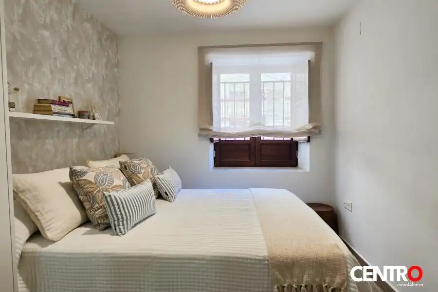 Dormitori de Apartament de lloguer en Granada amb Aire condicionat