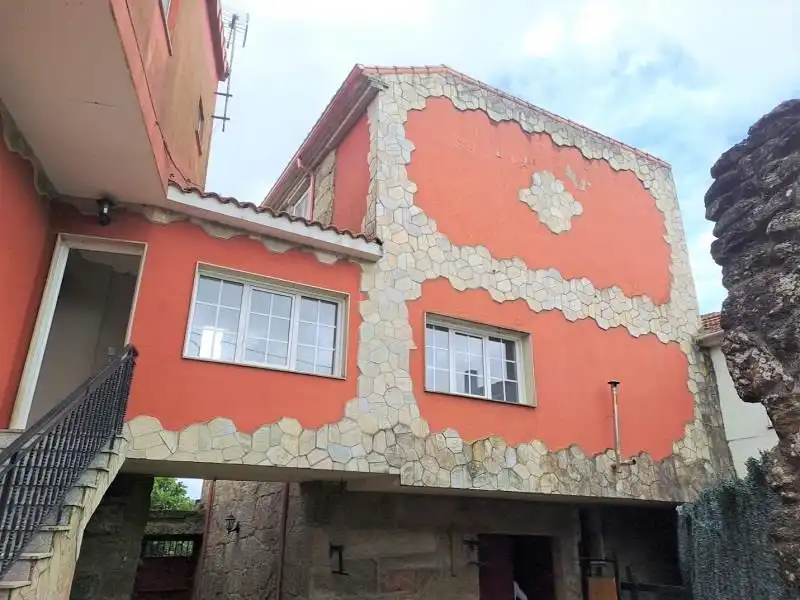Vista exterior de Casa adosada en venda en A Cañiza   amb Terrassa i Alarma