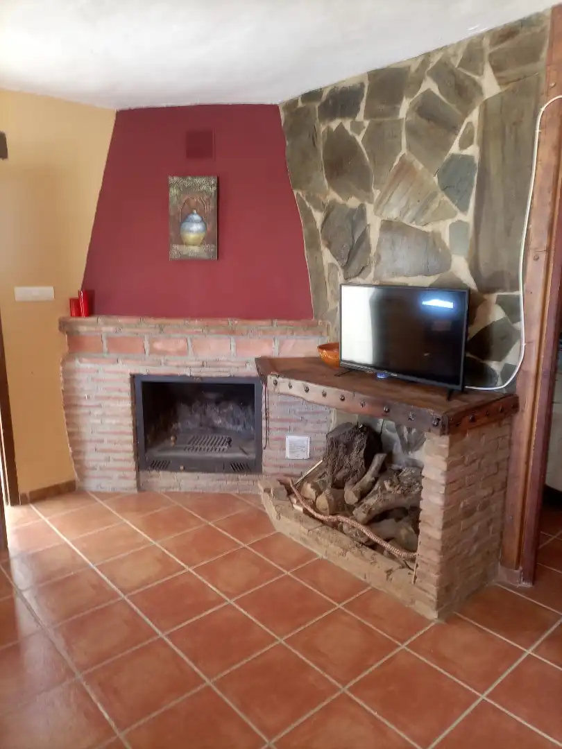 Sala de estar de Apartamento en venta en Alpujarra de la Sierra con Calefacción, Amueblado y Microondas