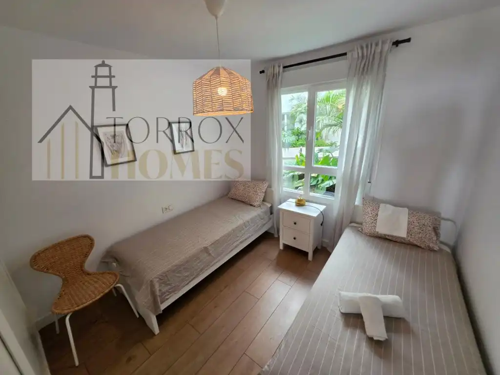 Dormitori de Apartament en venda en Torrox