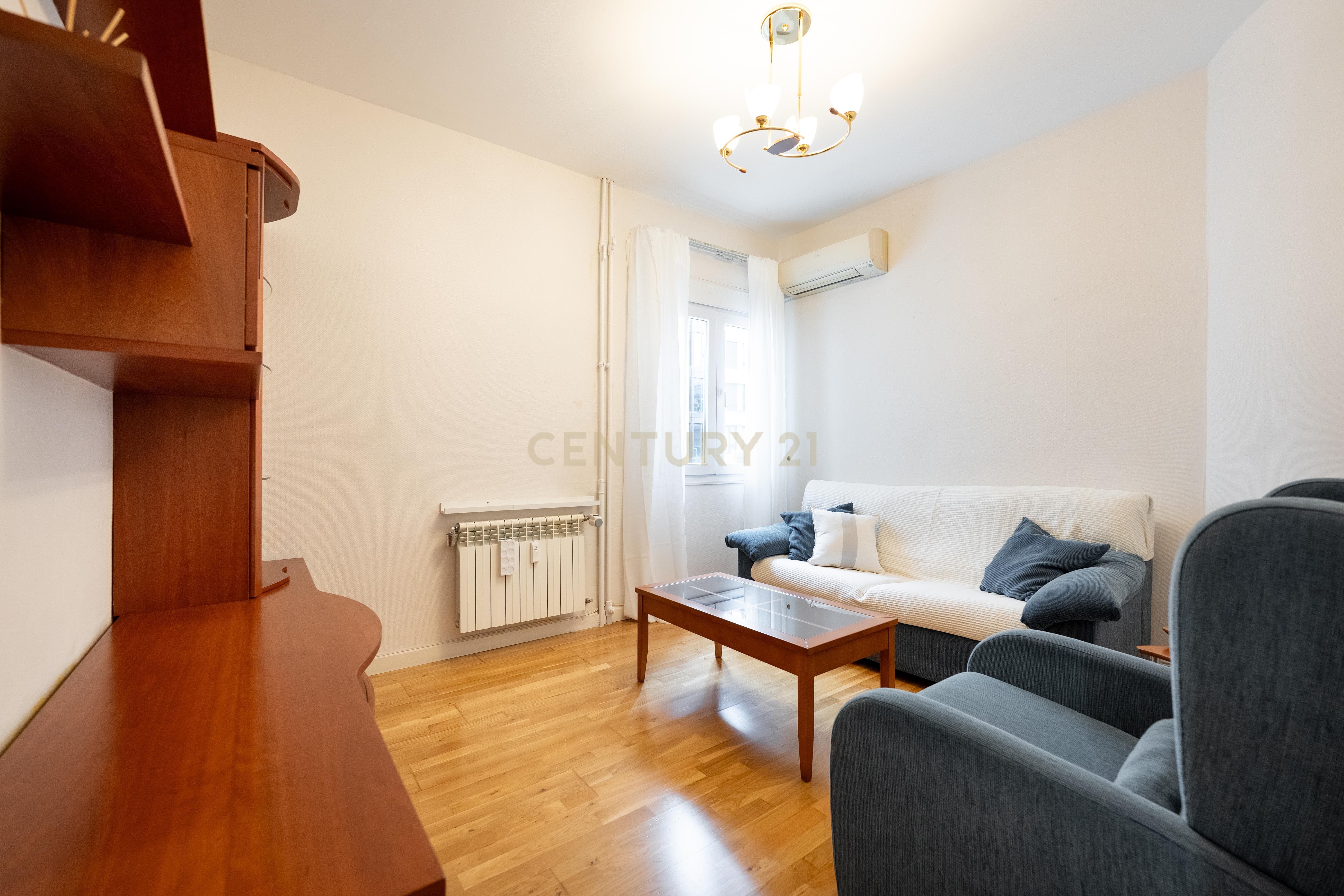 Living room of Apartment to rent in  Madrid Capital  with Air Conditioner and Washing machine