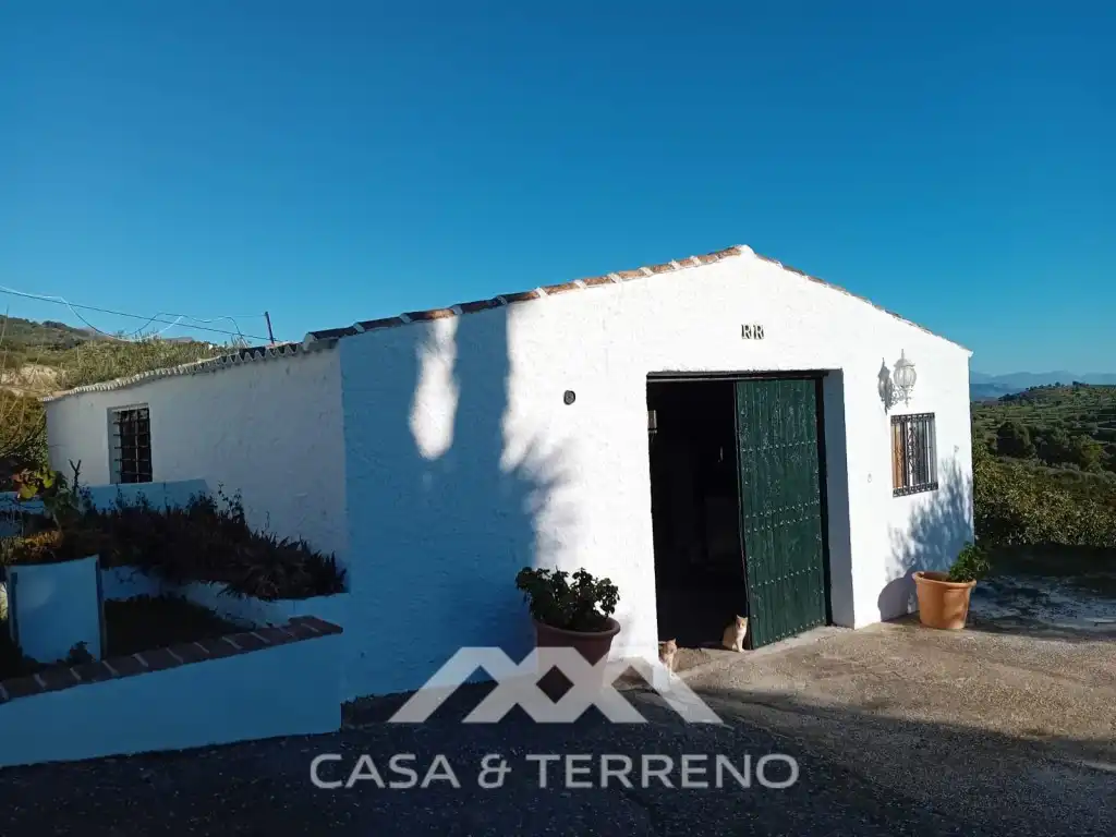 Vista exterior de Casa o xalet en venda en Alozaina amb Piscina
