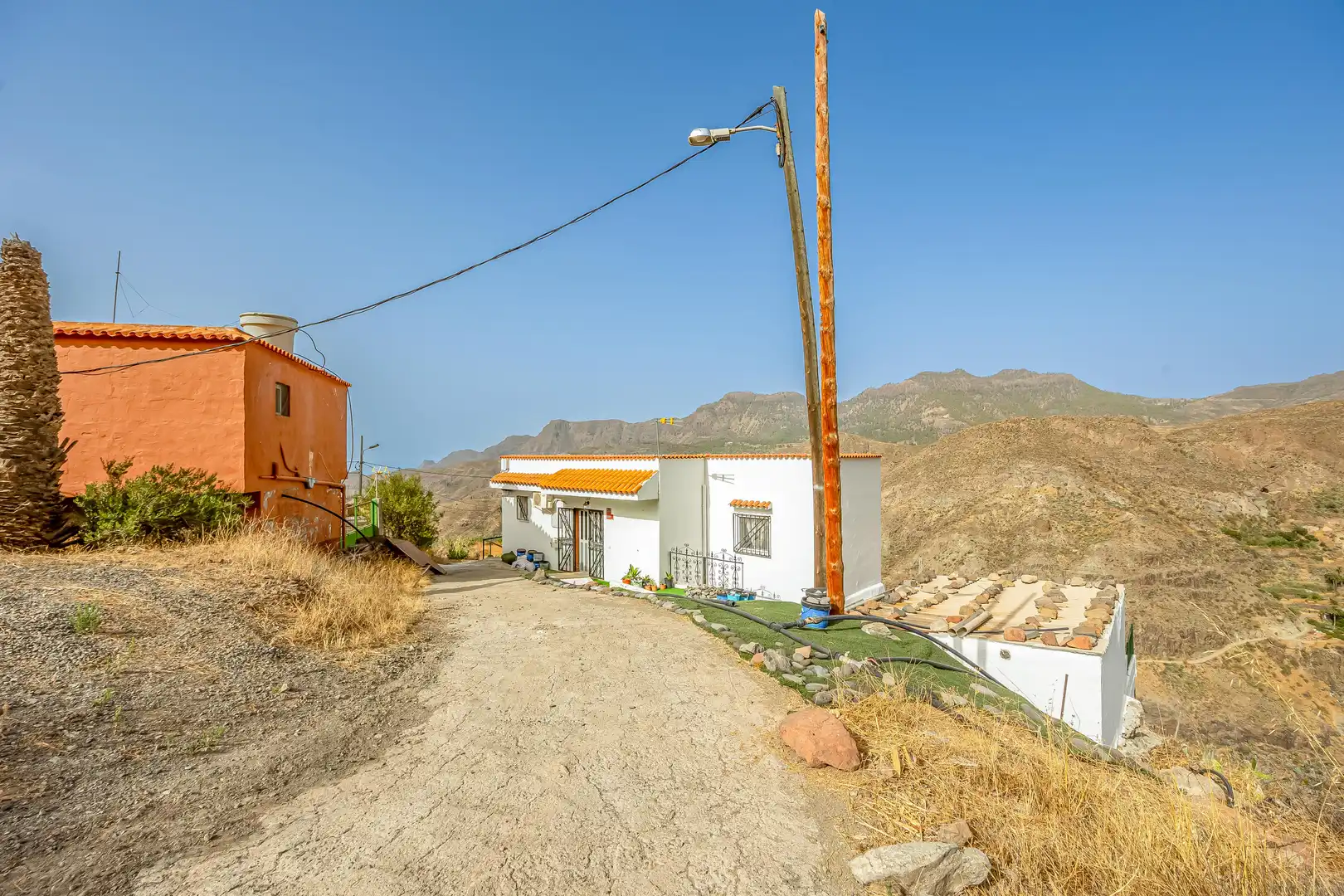 Vista exterior de Casa o xalet en venda en San Bartolomé de Tirajana amb Aire condicionat, Jardí privat i Terrassa