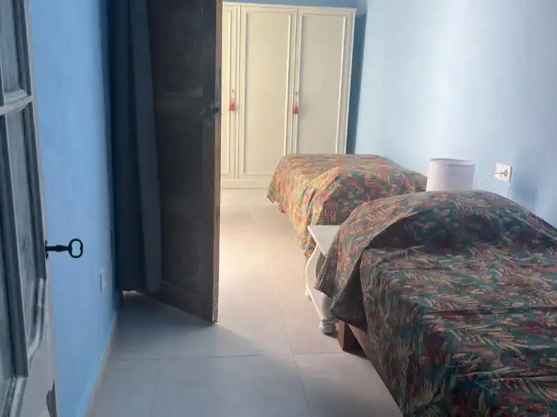 Dormitori de Casa adosada en venda en Los Silos amb Jardí privat, Parquet i Piscina