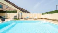 Swimming pool of Single-family semi-detached for sale in Mogán  with Terrace, Swimming Pool and Community pool