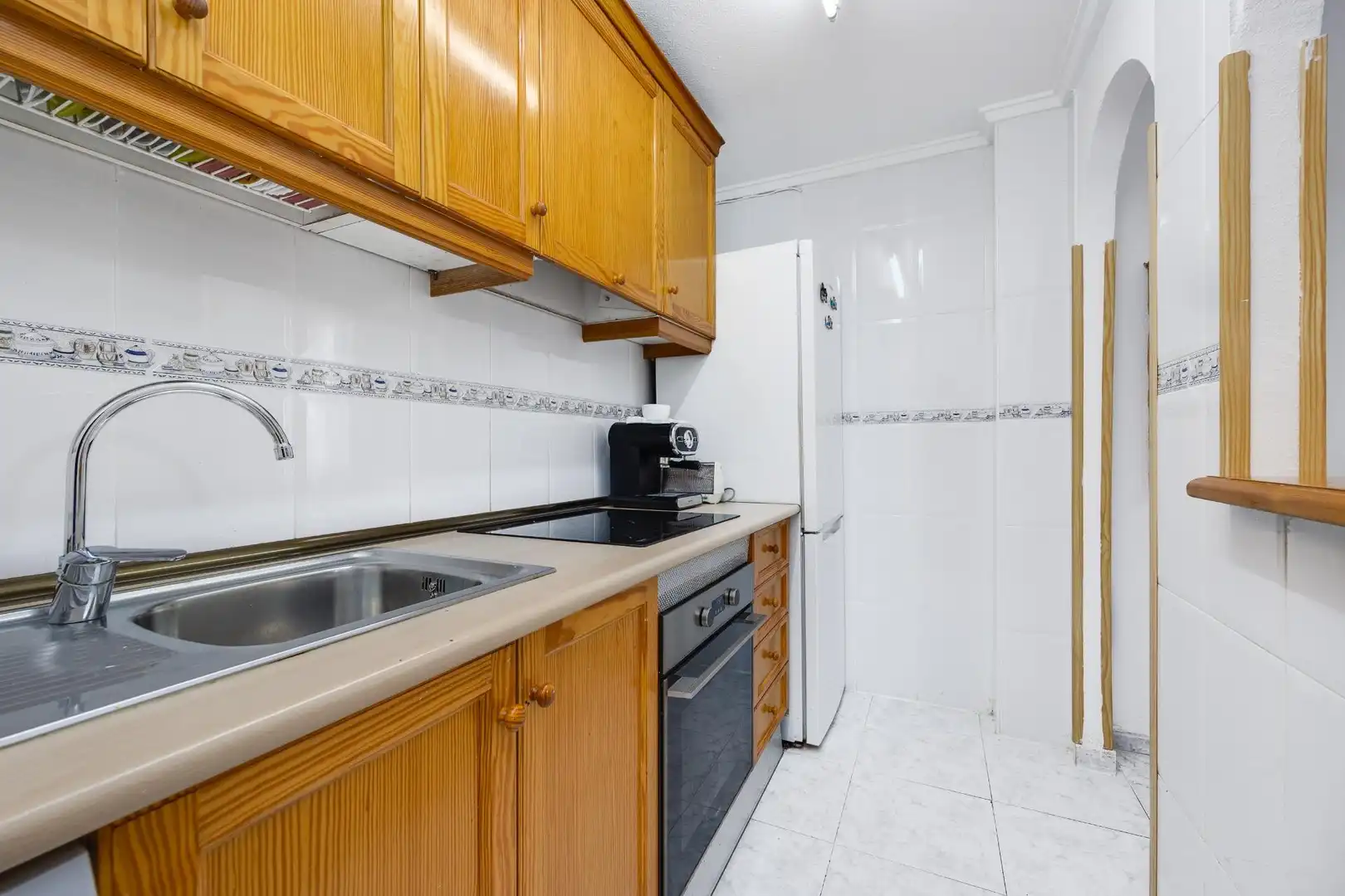 Cuina de Apartament en venda en Torrevieja amb Aire condicionat, Jardí privat i Terrassa