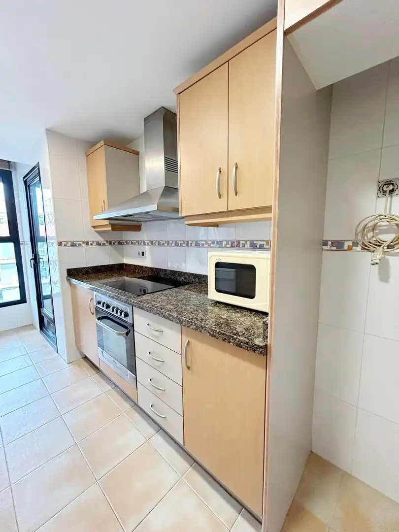 Kitchen of Apartments for rent in Gandia  with Air Conditioner, Heating and Private garden